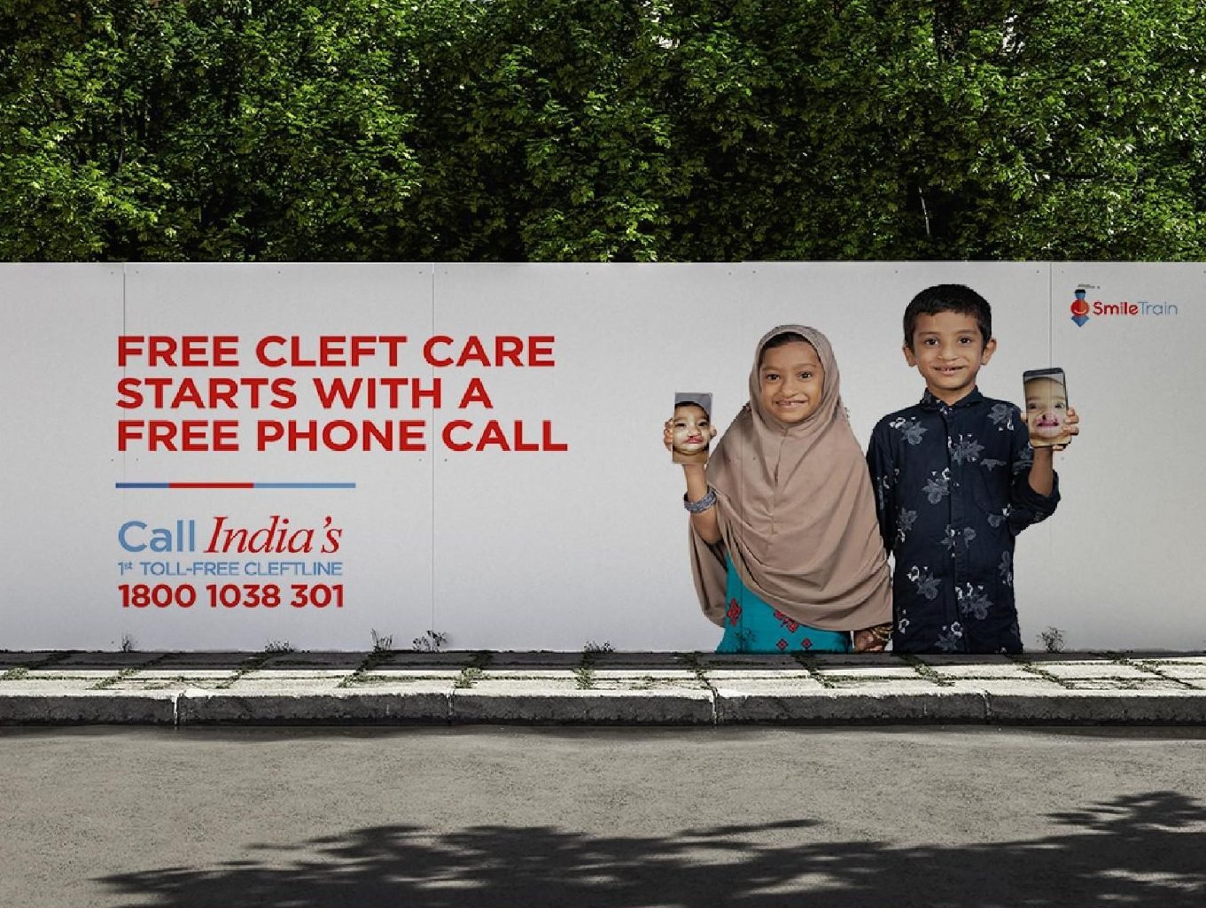 Roadside hoarding: Free cleft care starts with a free phone call, 1800 1038 301